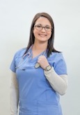 Picture of a female Nurse smiling.